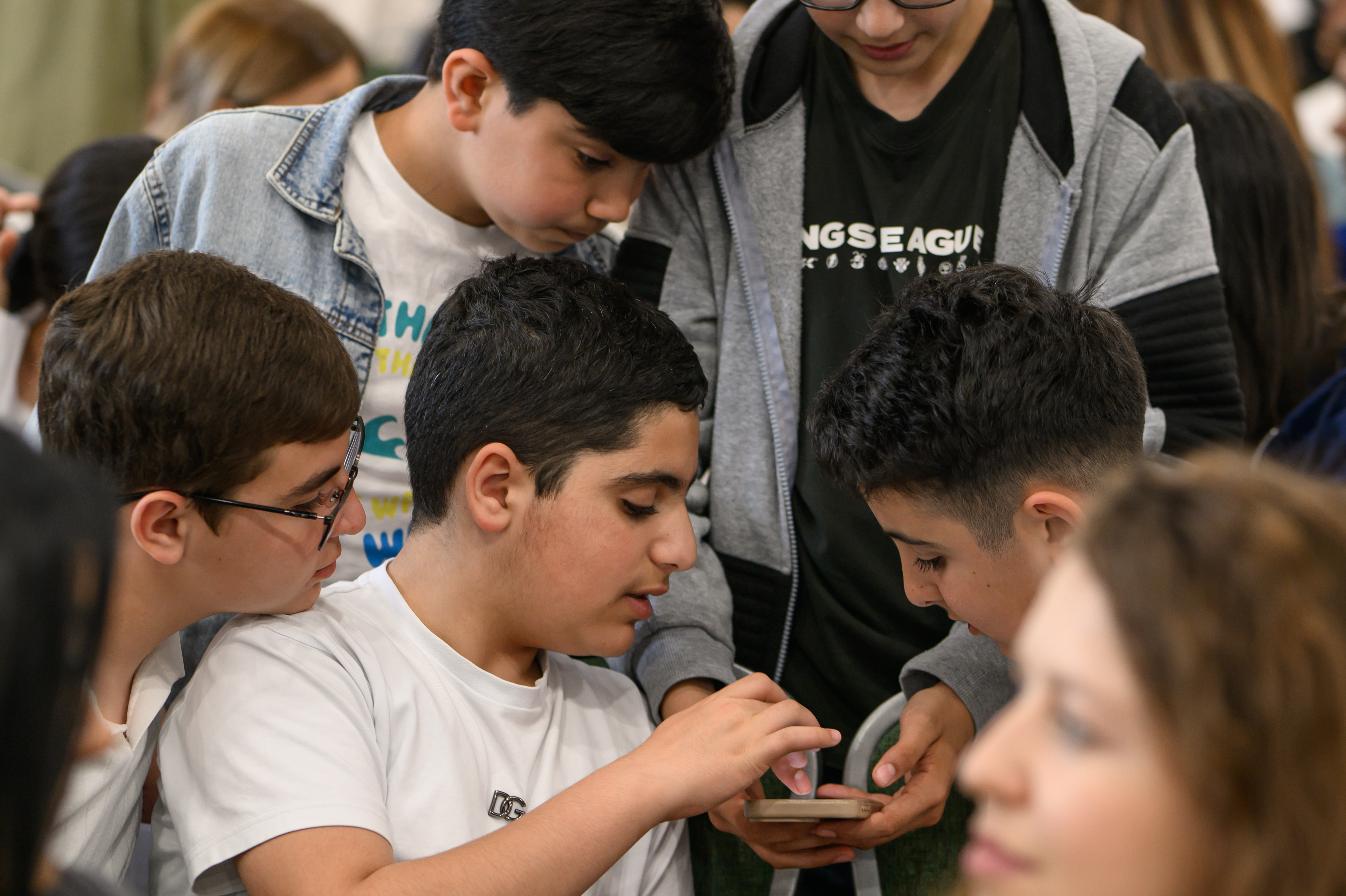 Children are playing on phones