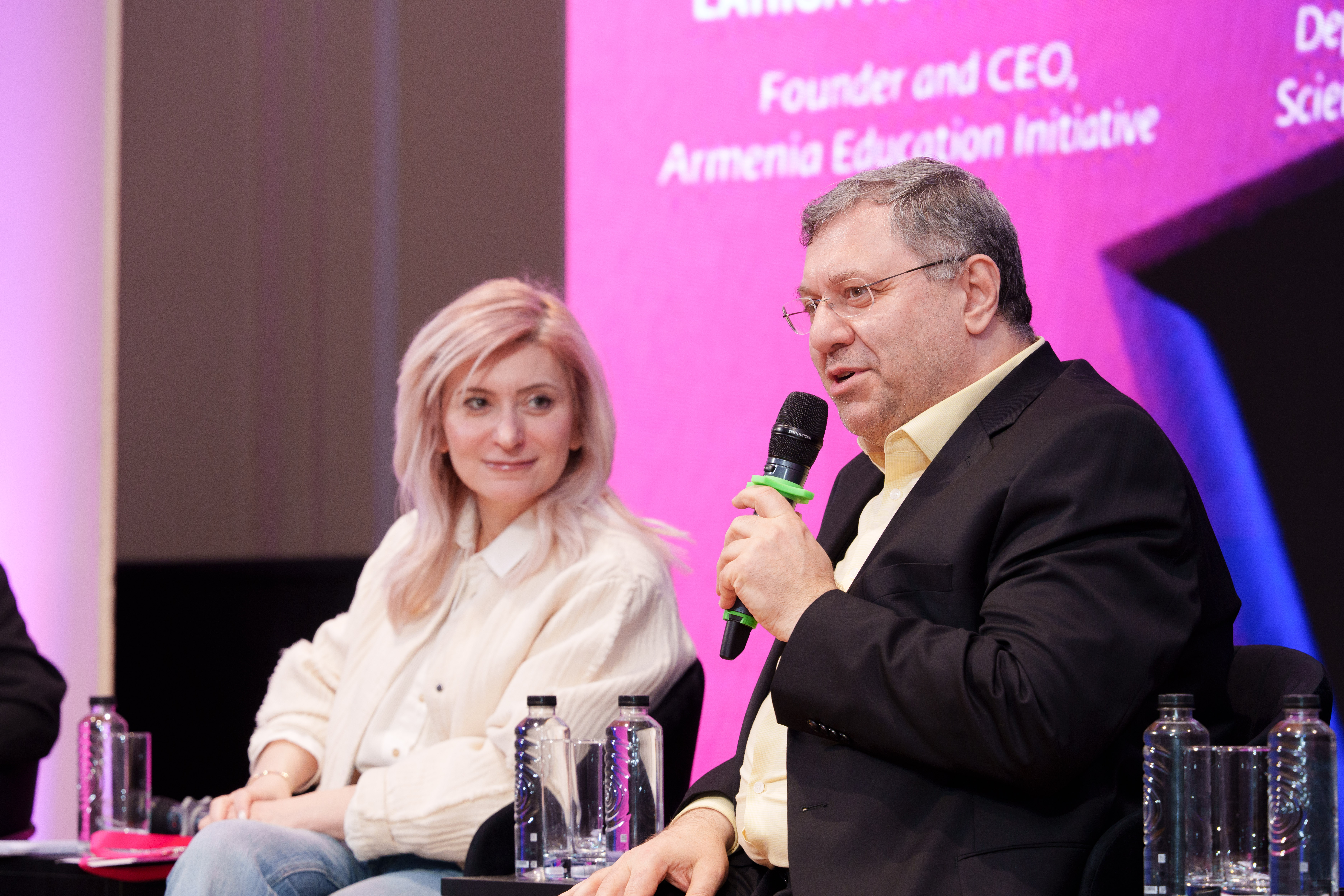 Nerses Yeritsyan and Araksia Svajyan are sitting during the panel discussion.